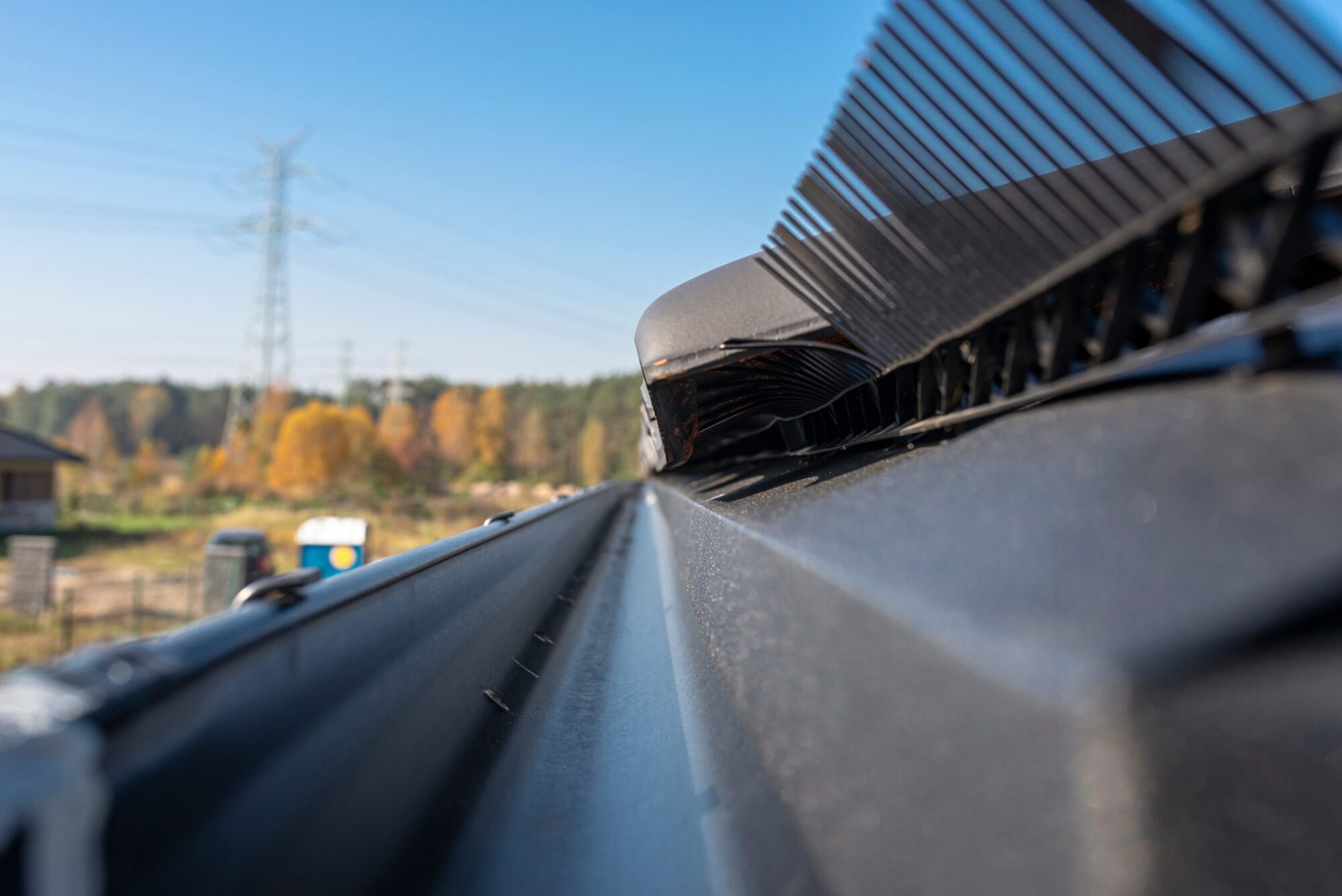 A Metal Black Gutter On A Roof Covered With Ceram 2022 11 10 18 00 41 Utc