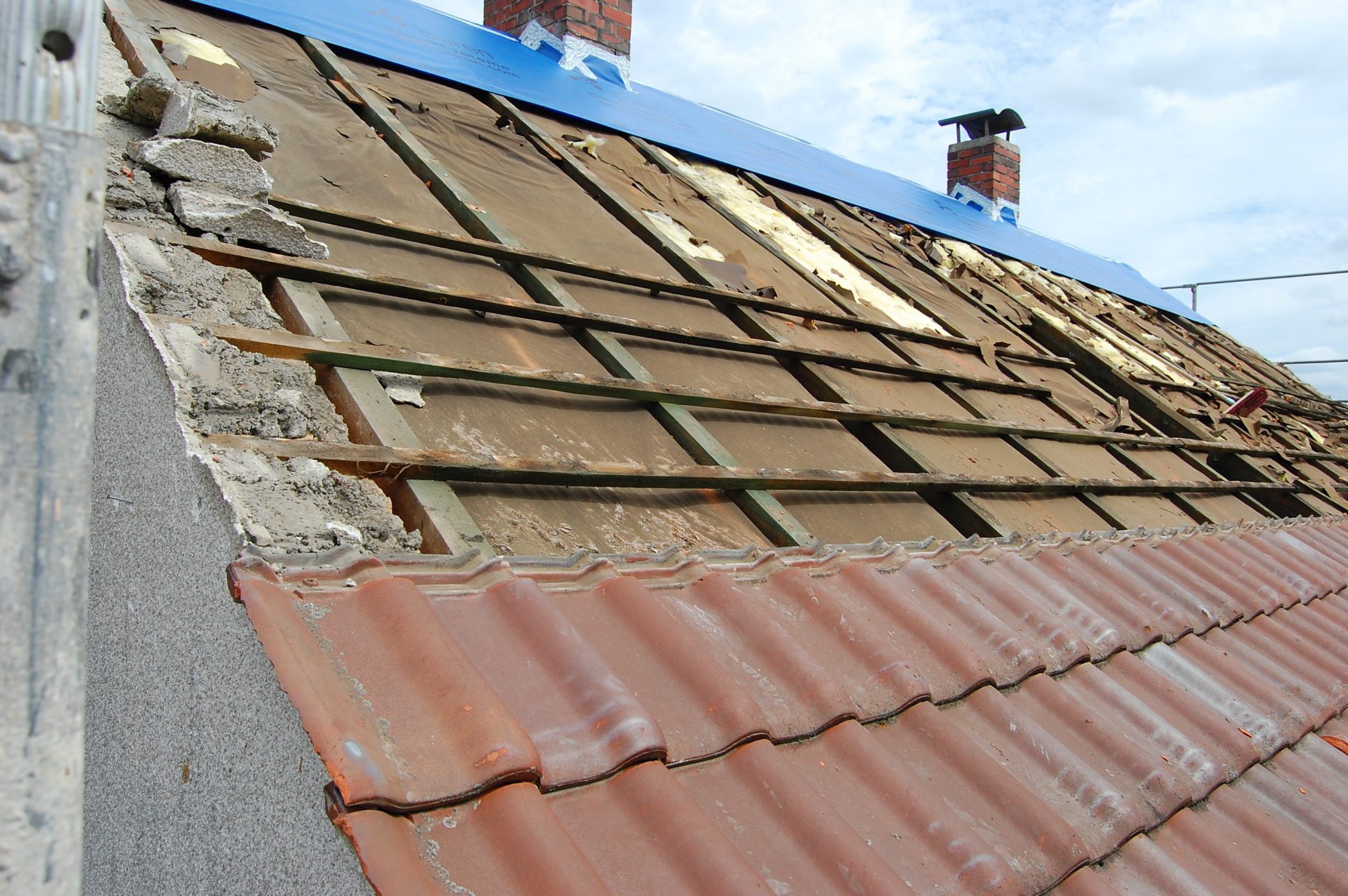 Work On A Roof Partly Removed Roof Tiles And Stil 2022 09 23 21 00 38 Utc